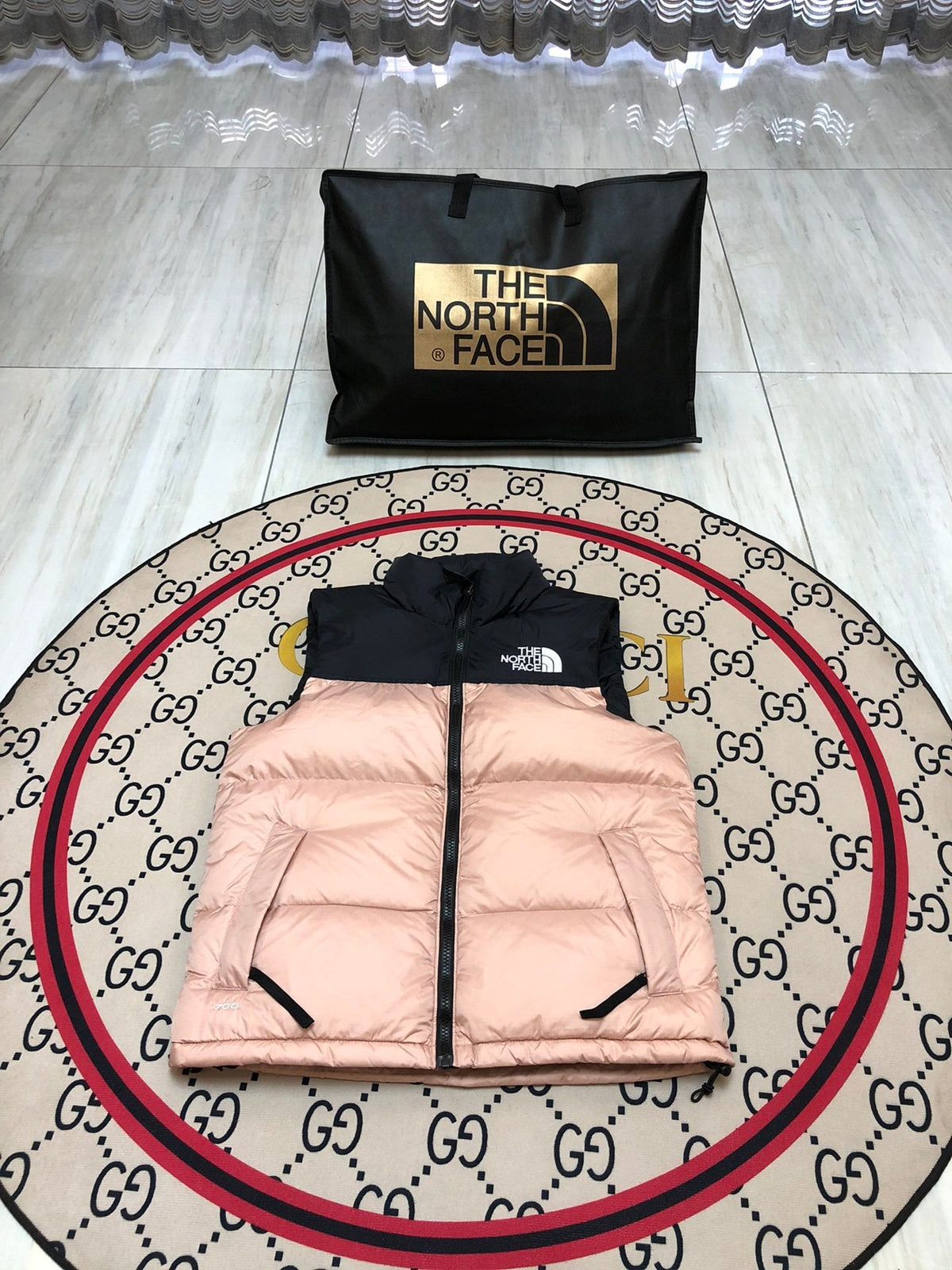 The North Face Puffer Vest in Blush Pink and Black with Stand Collar