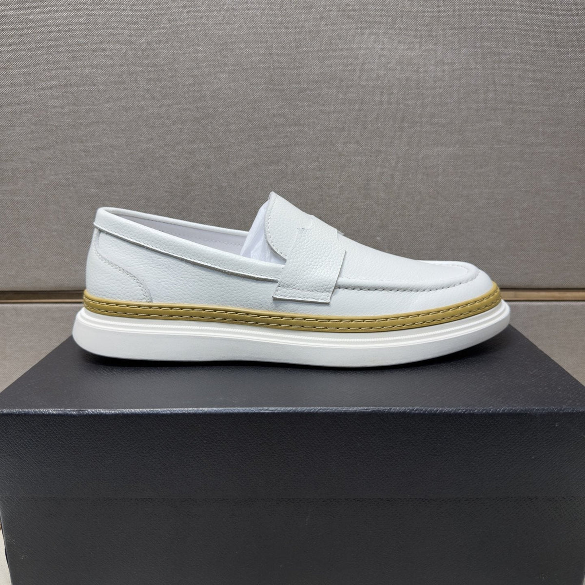 Prada Gold Accent Slip-On Loafers