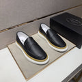 Prada Gold Accent Slip-On Loafers